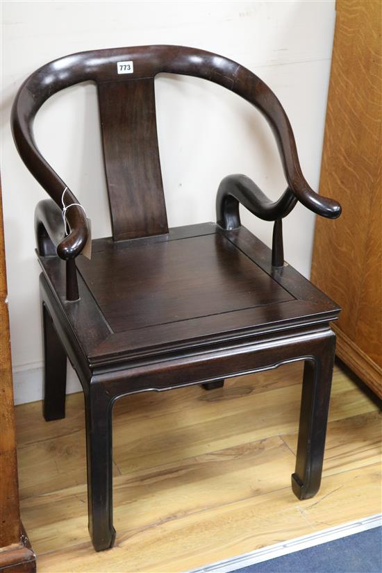 A Chinese hardwood open arm solid seat chair, with makers label